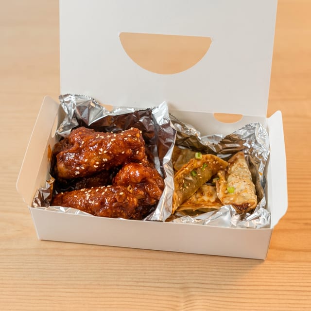 Lunch Wings & Soy Vegetable Dumplings & Soda.